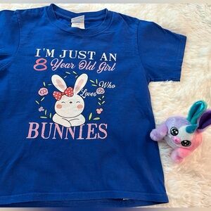 Just an 8 year old who loves bunnies shirt. Size XS, royal blue